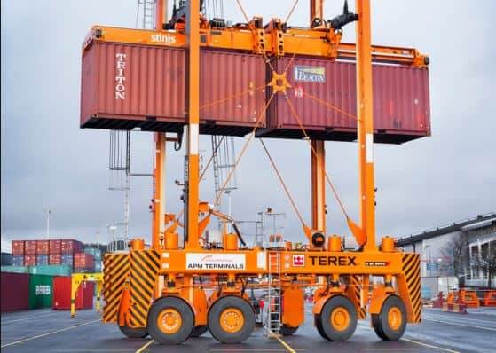 A Shipping Container On A Crane