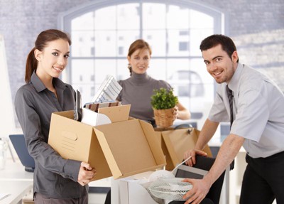 People Packing And Moving Office Supplies