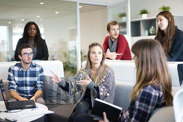 People in a casual meeting in an office.
