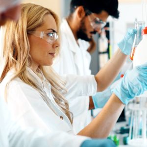 young-students-of-chemistry-working-in-laboratory