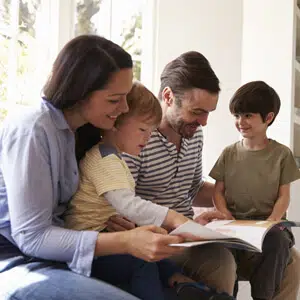 Family reading a book