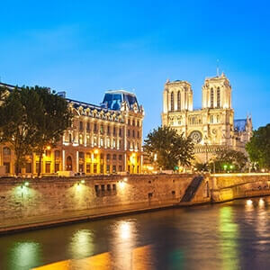 Notre Dame Cathedral in Paris, France in the evening