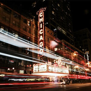 Outside view of a theatre in Chicago lit up at night