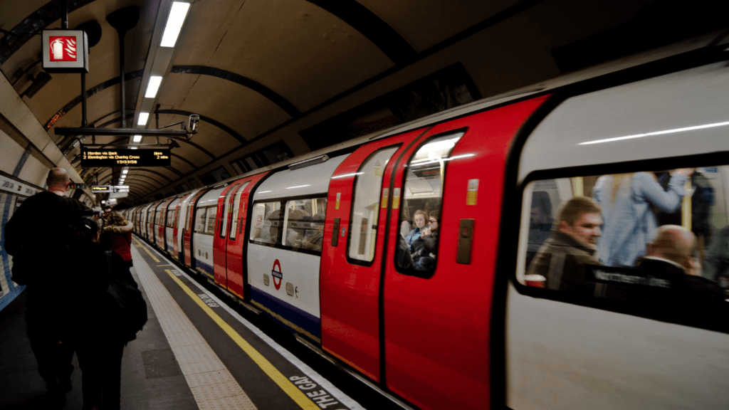 A London tube leaving the station full of people