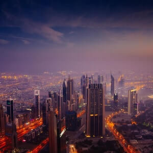 Aerial view of the sun rising over Dubai’s central business district