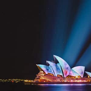 Sydney Opera House lit up at night
