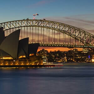 View of Sydney Opera House and the Harbour Bridge at sunset