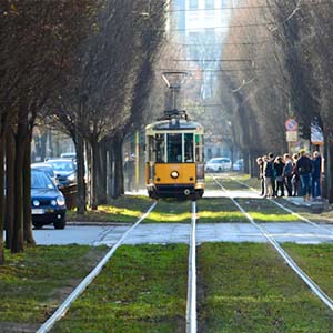 Taken looking down a tram line in the outskirts of Milan city during rush hour Taken looking down a tram line in the outskirts of Milan city during rush hour