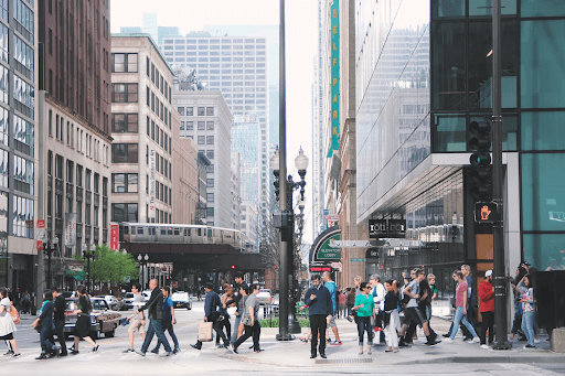 A Busy Downtown City Area With Many International Businesses