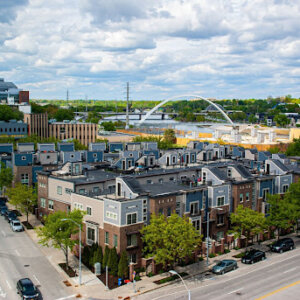 Des Moines apartment blocks with cars parked on the main road