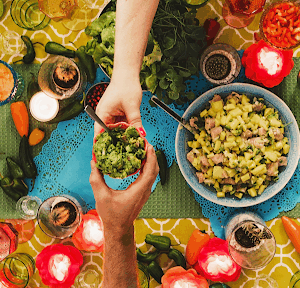 Family enjoying Tex Mex cuisine at a dining table