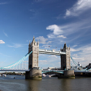 Tower bridge in London, UK, with blue skies overhead