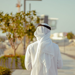 Man in Dubai wearing a traditional Kandura