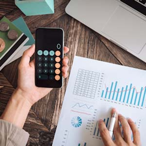 working out the costs involved for relocating with graphs and a calculator