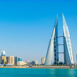 Skyline of Bahrain’s skyscrapers from the water on a clear day