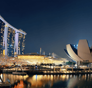 Singapore skyline at night with an array of urban buildings