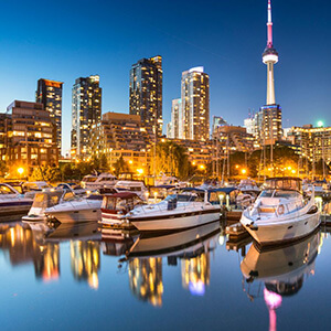 A skyline of the CN Tower along Lake Ontario in Toronto, Canada