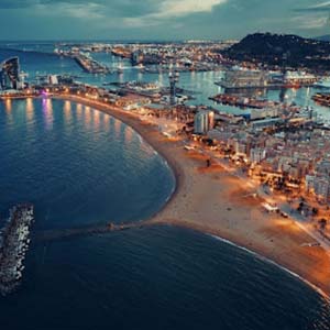 Aerial view of the coast of Barcelona, Spain at night
