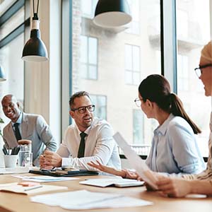 A business meeting with people in discussion