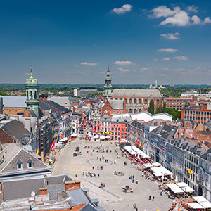 Aerial skyline summer view of vibrant central square (Grand-Place de Mons) and old town hall of Mons (Bergen). Wallonia, capital of Hainaut, Belgium Aerial skyline summer view of vibrant central square (Grand-Place de Mons) and old town hall of Mons (Bergen). Wallonia, capital of Hainaut, Belgium